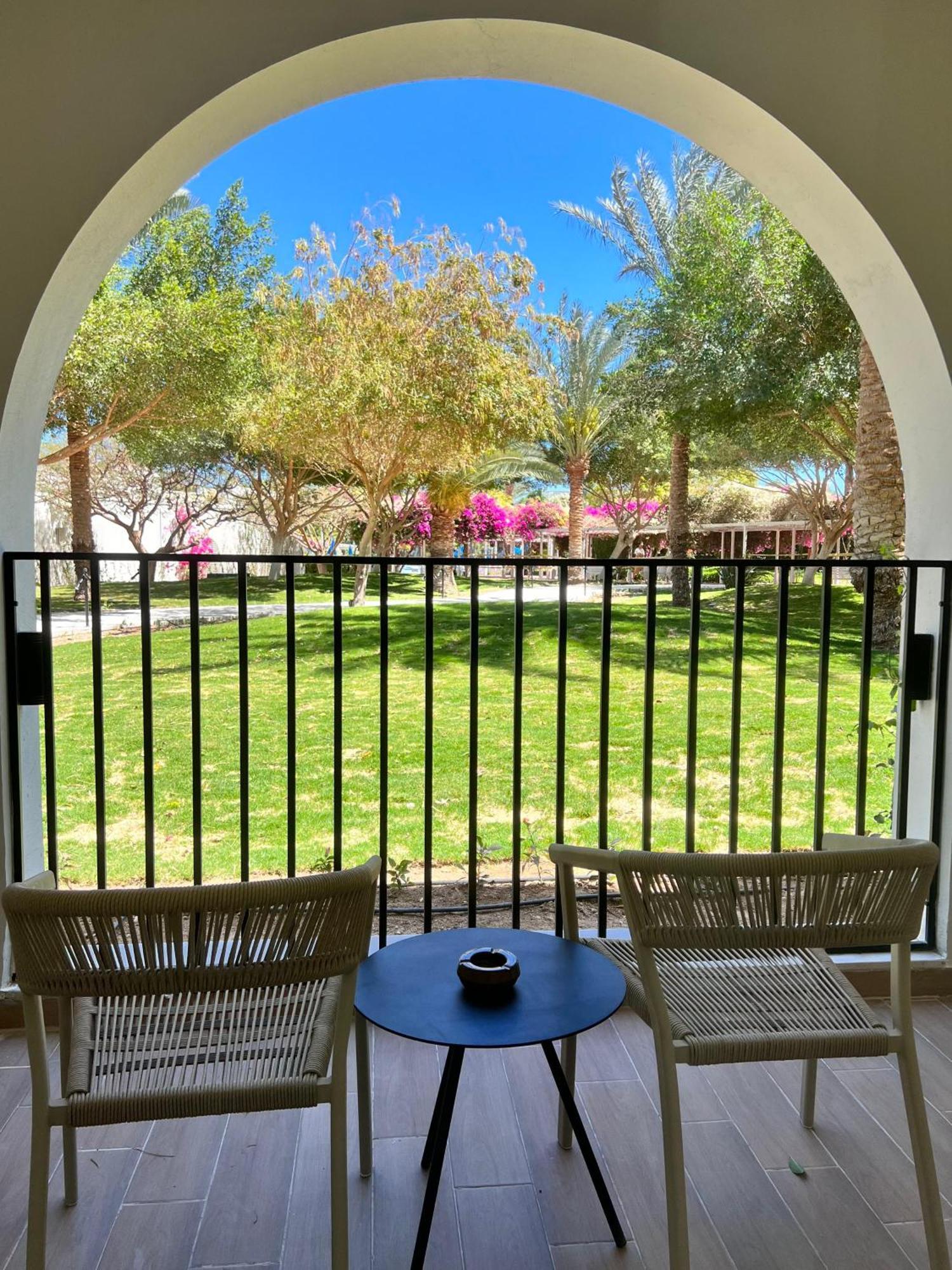 Desert Rose Resort Hurghada Esterno foto View of the garden from the hotel